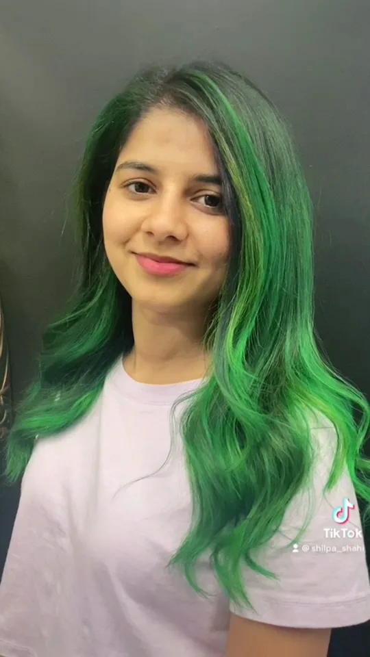 Vivid green fashion colour on dark background