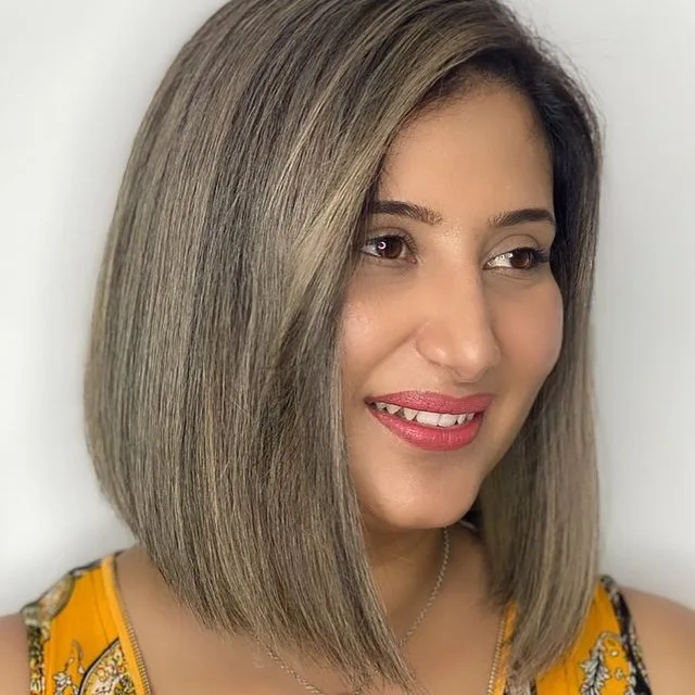 Ash-bronde bob, smiling
